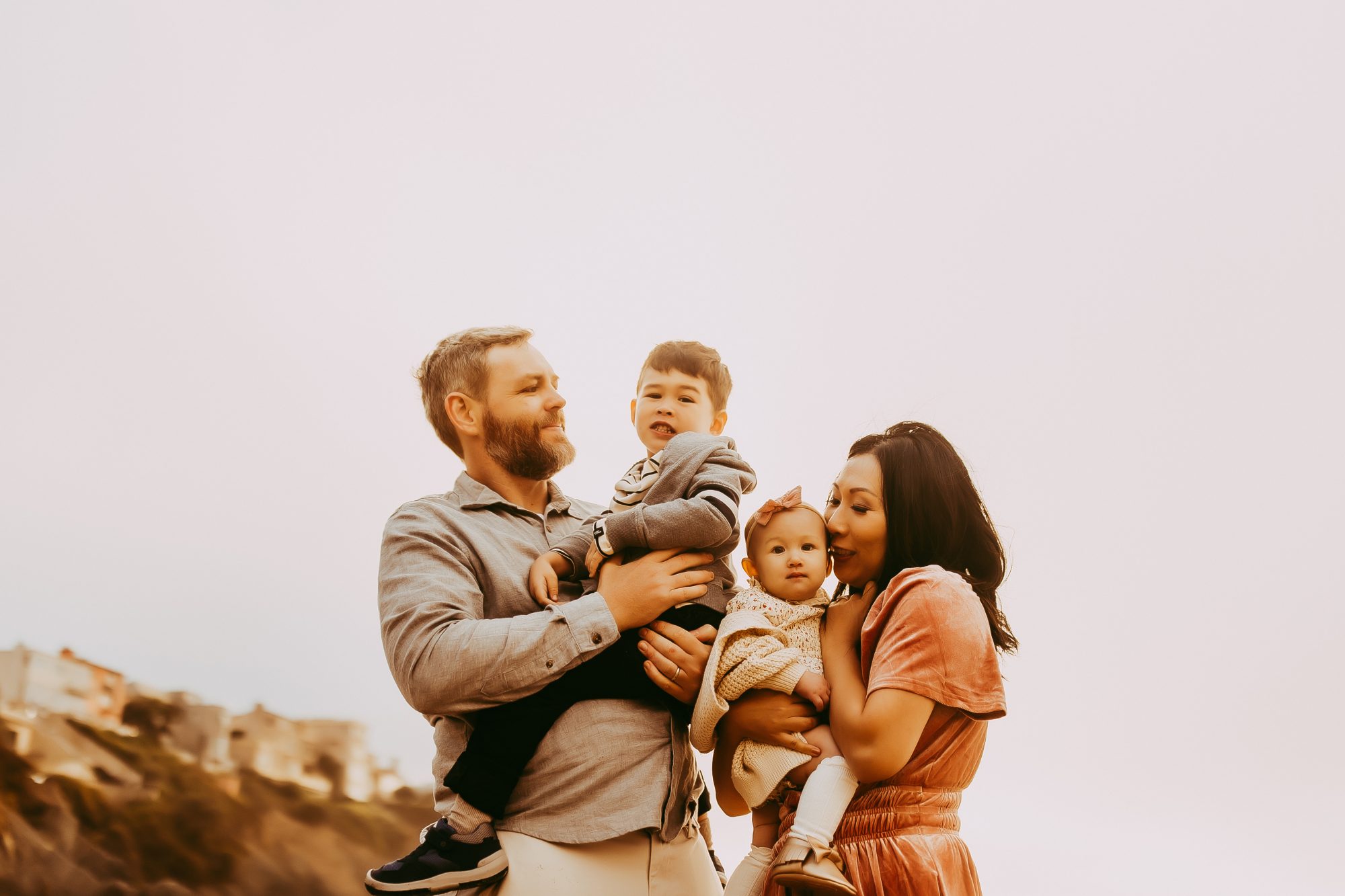 Shefali Parekh | Capturing Joy and Laughter: The Family Session at Baker Beach A family of four posing for a photograph
