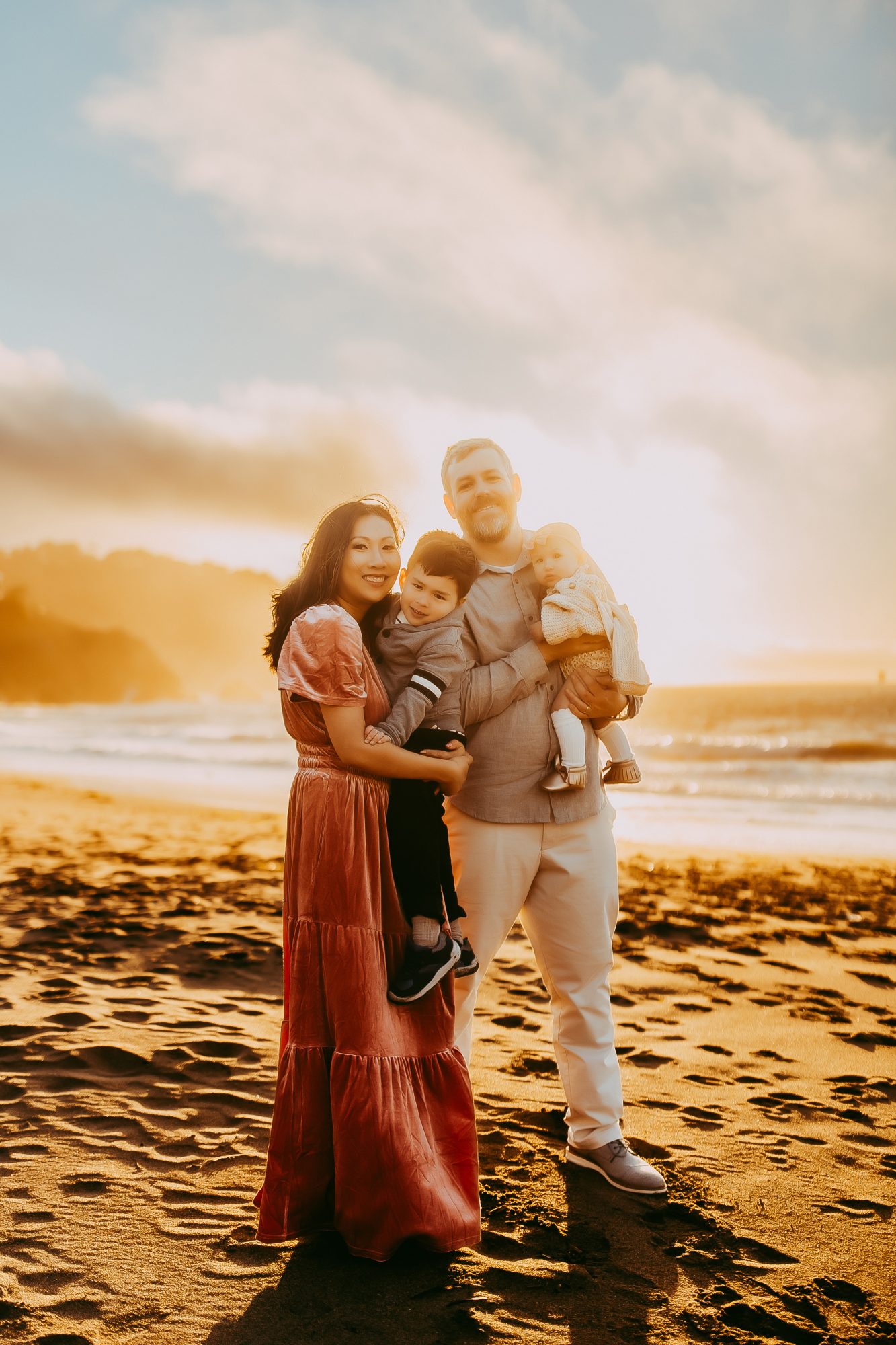 Shefali Parekh | Capturing Joy and Laughter: The Family Session at Baker Beach A family on a sandy beach