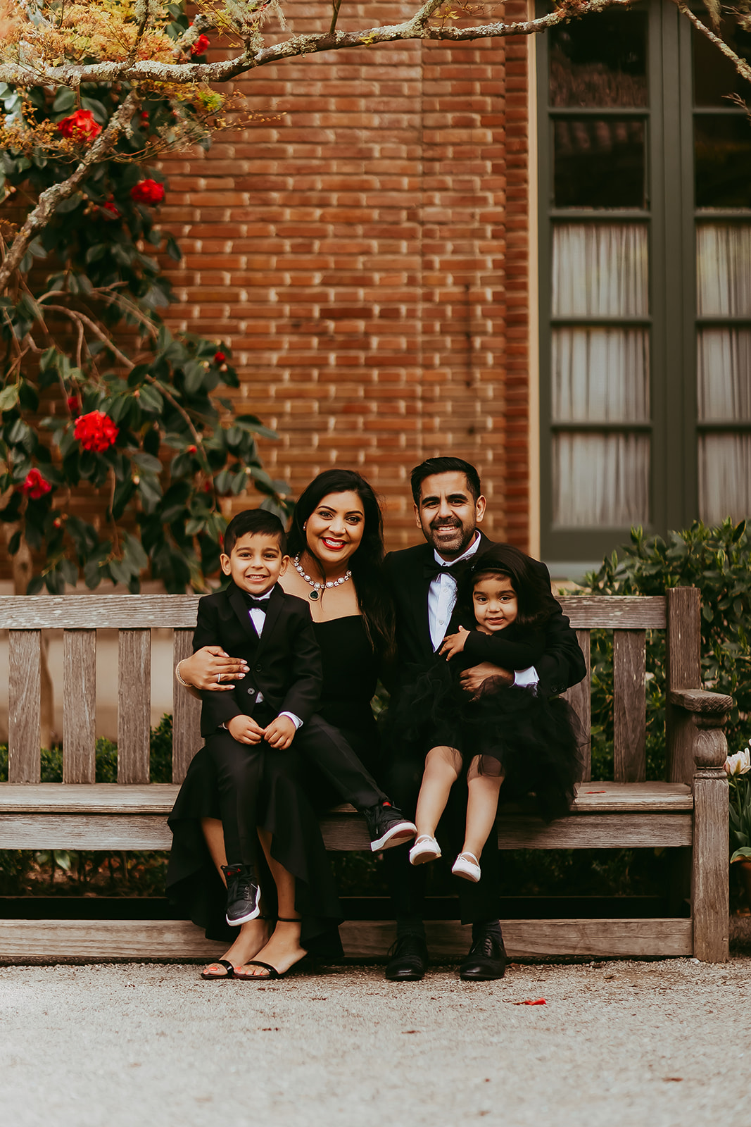 Shefali Parekh | Menlo Park Family Photographer: 10th Anniversary Session at Filoli Historic Garden Menlo Park family photographer captures family sitting together at Fioloi Gardens
