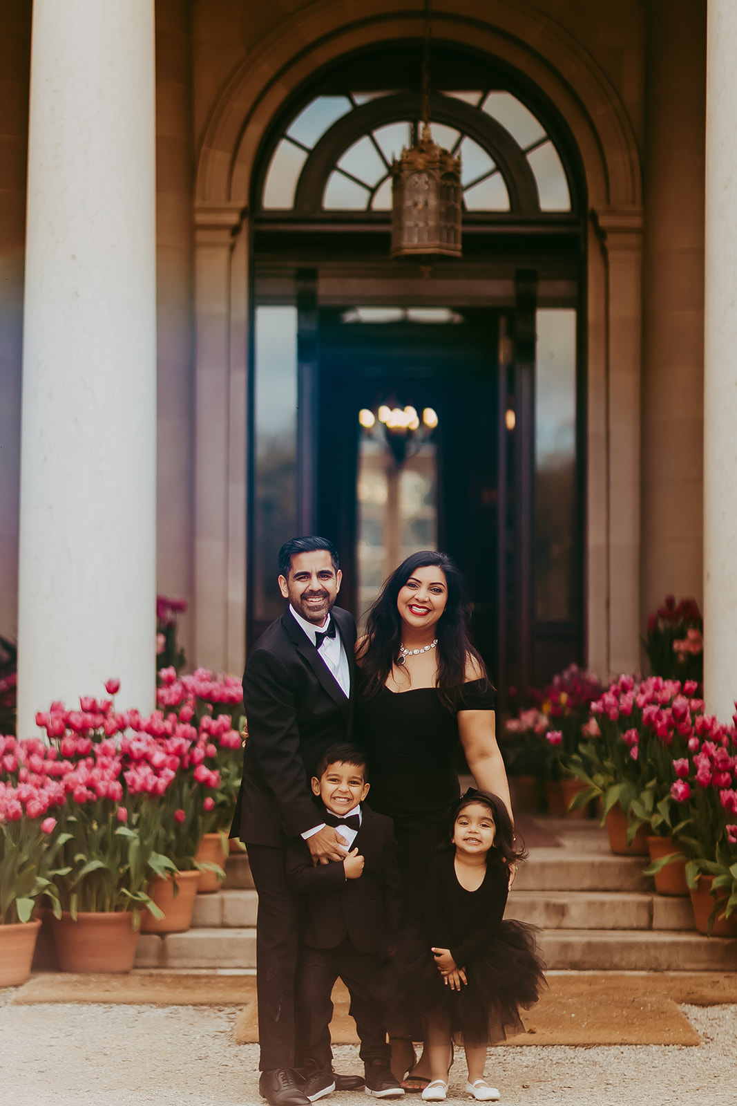 Shefali Parekh | Menlo Park Family Photographer: 10th Anniversary Session at Filoli Historic Garden Anniversary couple standing in iconic doorway at Filoli Historic House captured by Atherton family photographer