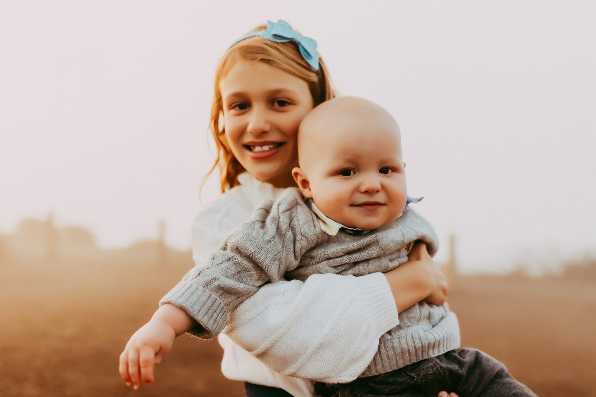 Shefali Parekh | Sunrise Family Photography in Marin County: Capturing Magic in the Morning Big sister with her youngest sibling