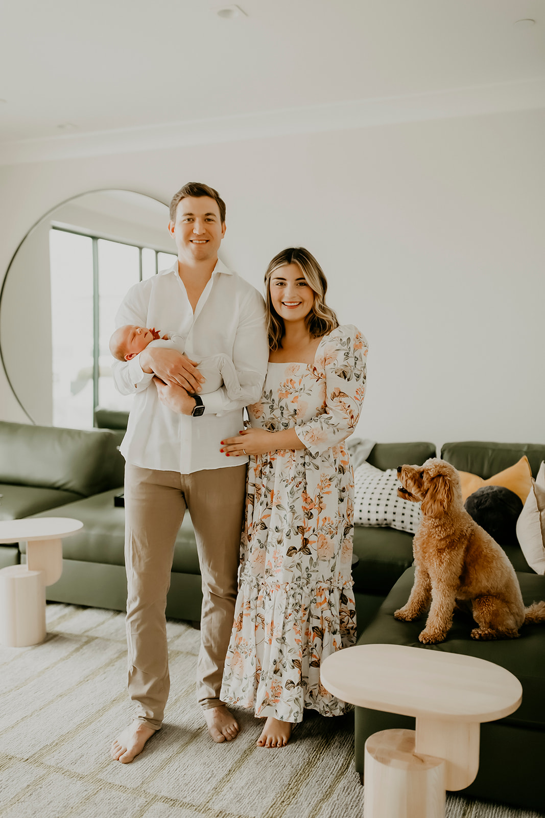 Shefali Parekh | Heartwarming In-Home Newborn Session: Maggie & Alex Black in Cow Hollow, San Francisco Couple posing with their newborn along with their dog