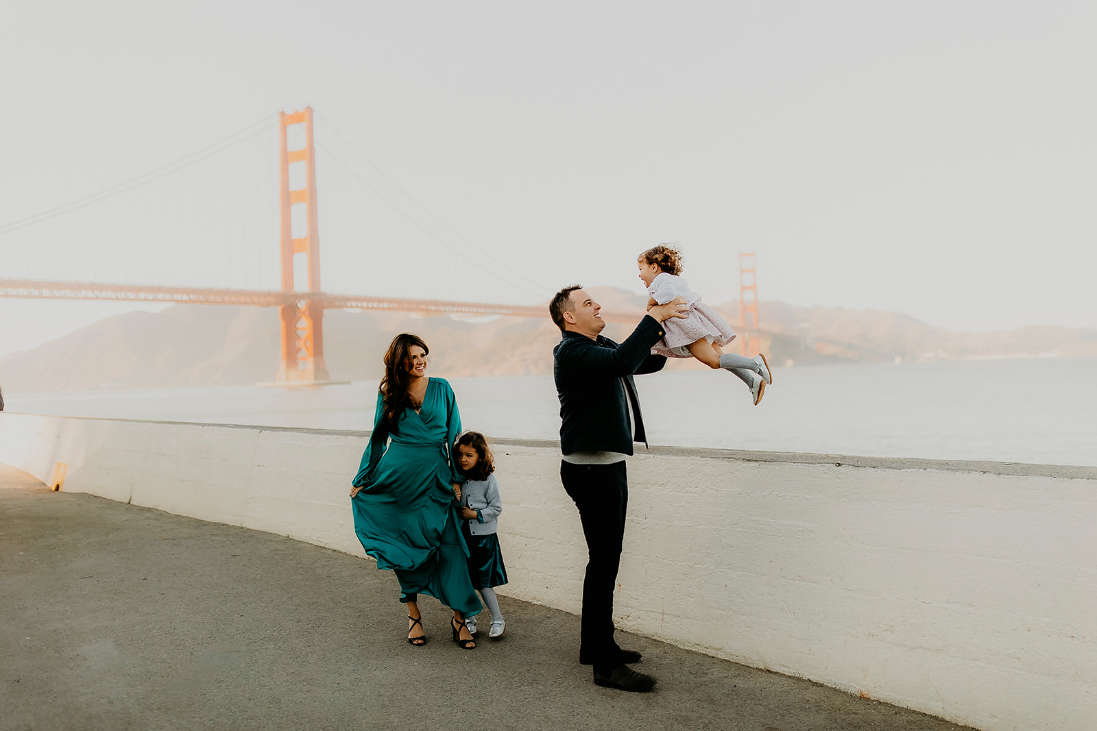 Shefali Parekh | The Best Location for Family Photography: Crissy Field Family having a happy moment with Bay Area Photographer
