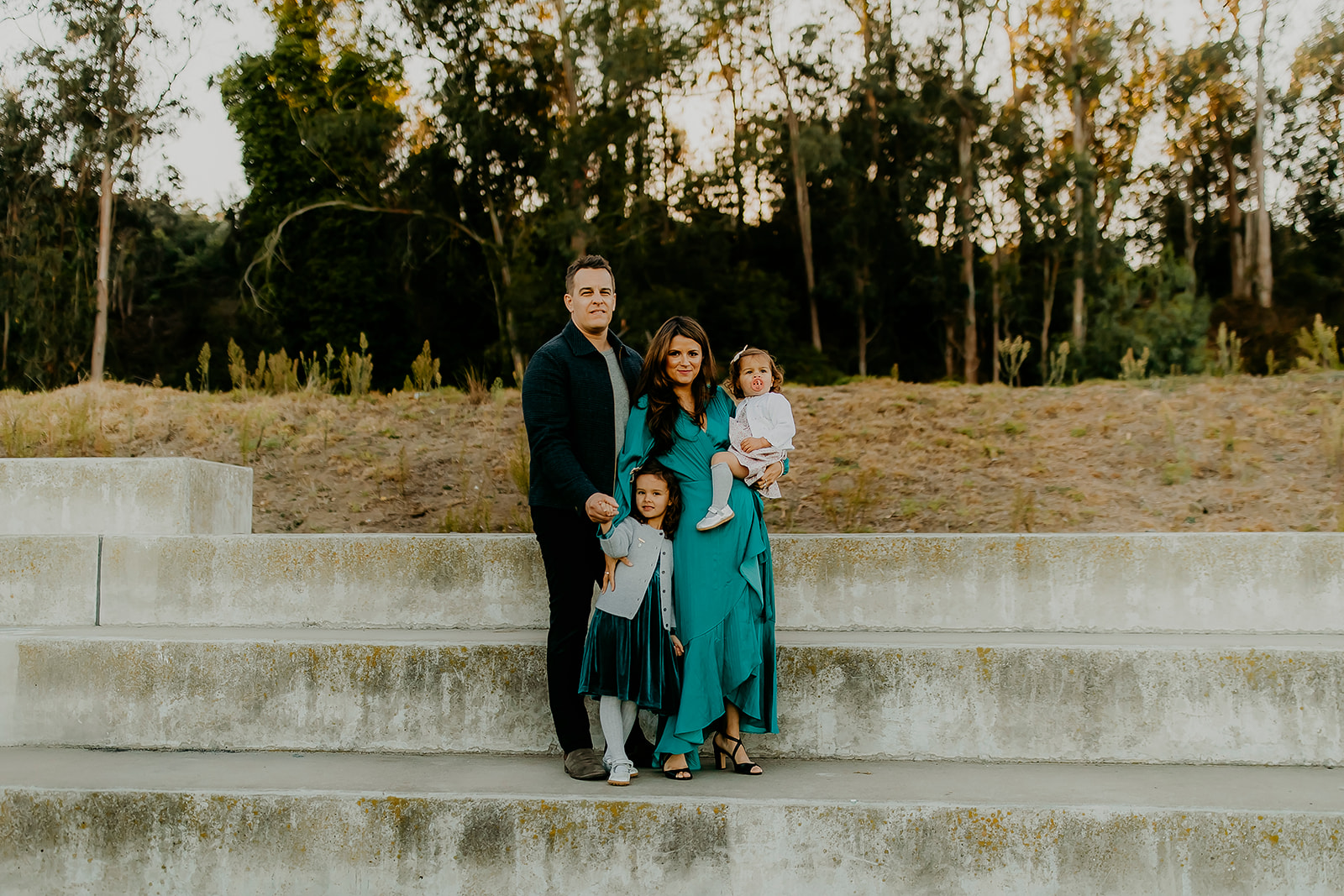 Shefali Parekh | The Best Location for Family Photography: Crissy Field Family of four posing for a picture