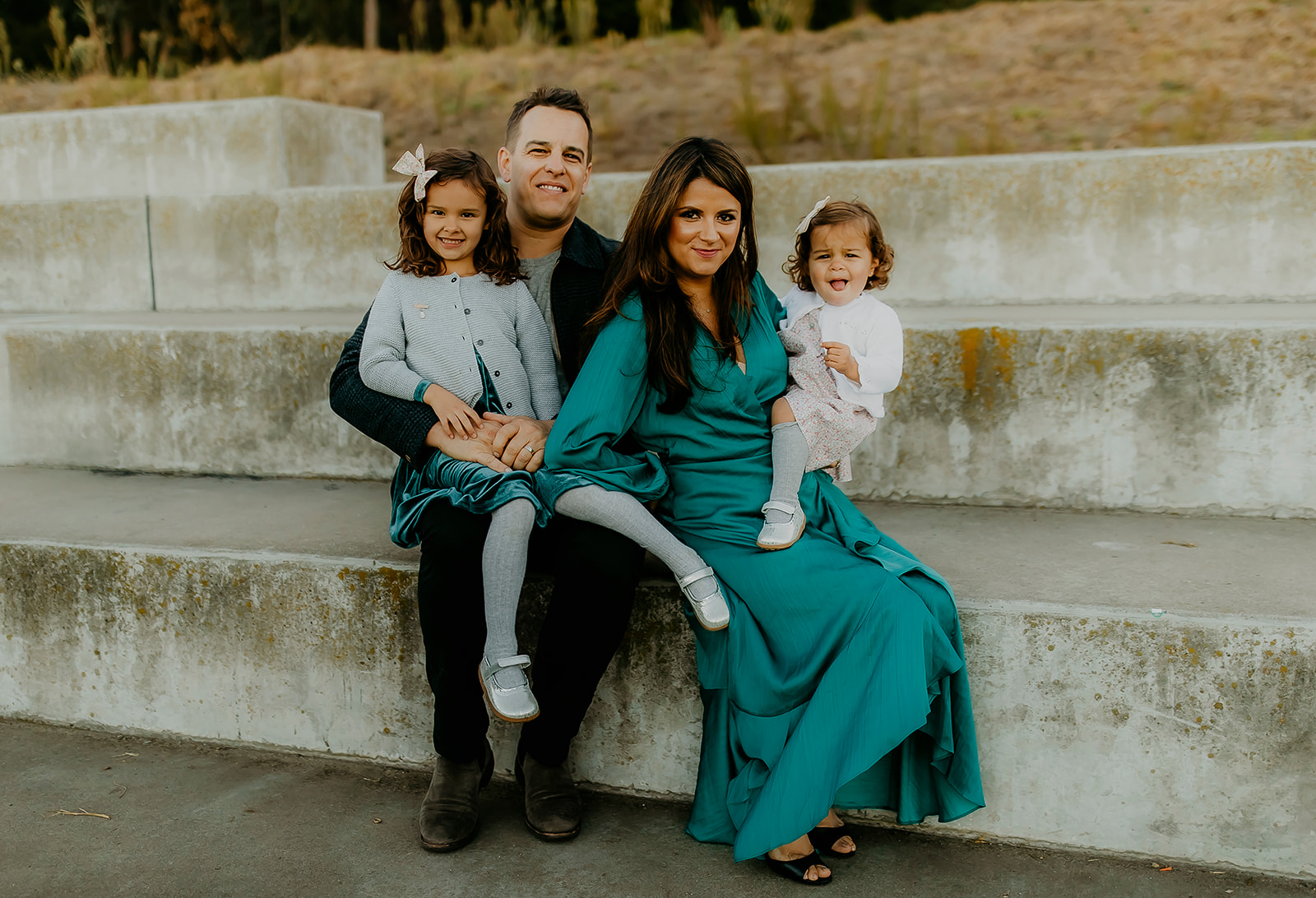 Shefali Parekh | The Best Location for Family Photography: Crissy Field Family of four sitting on stairs