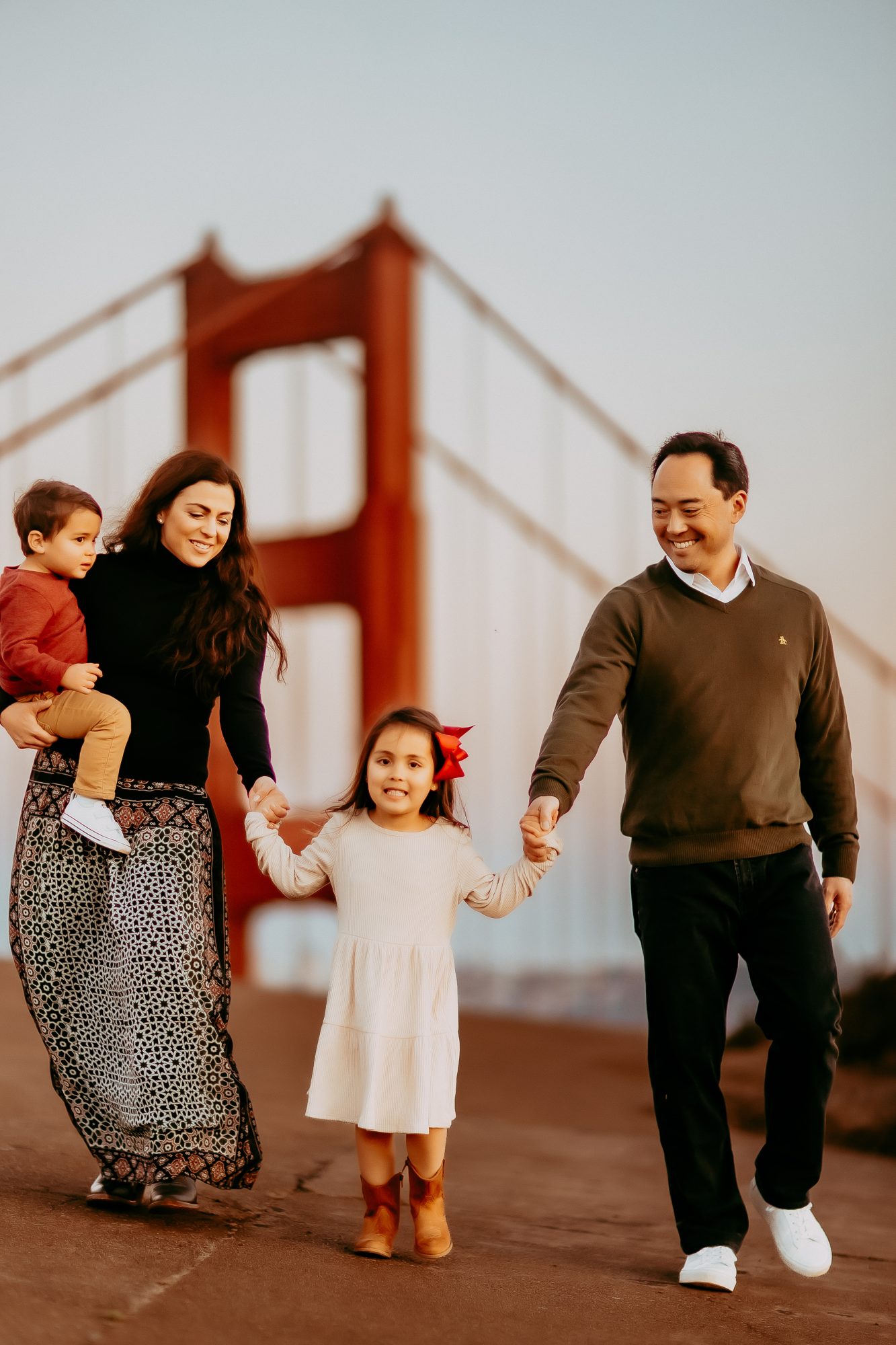 Shefali Parekh | Marin County Family Photographer: Battery Spencer Family Photos Family of four walking by the golden gate bridge with Shefali Parekh Photography, Marin County Family Photographer