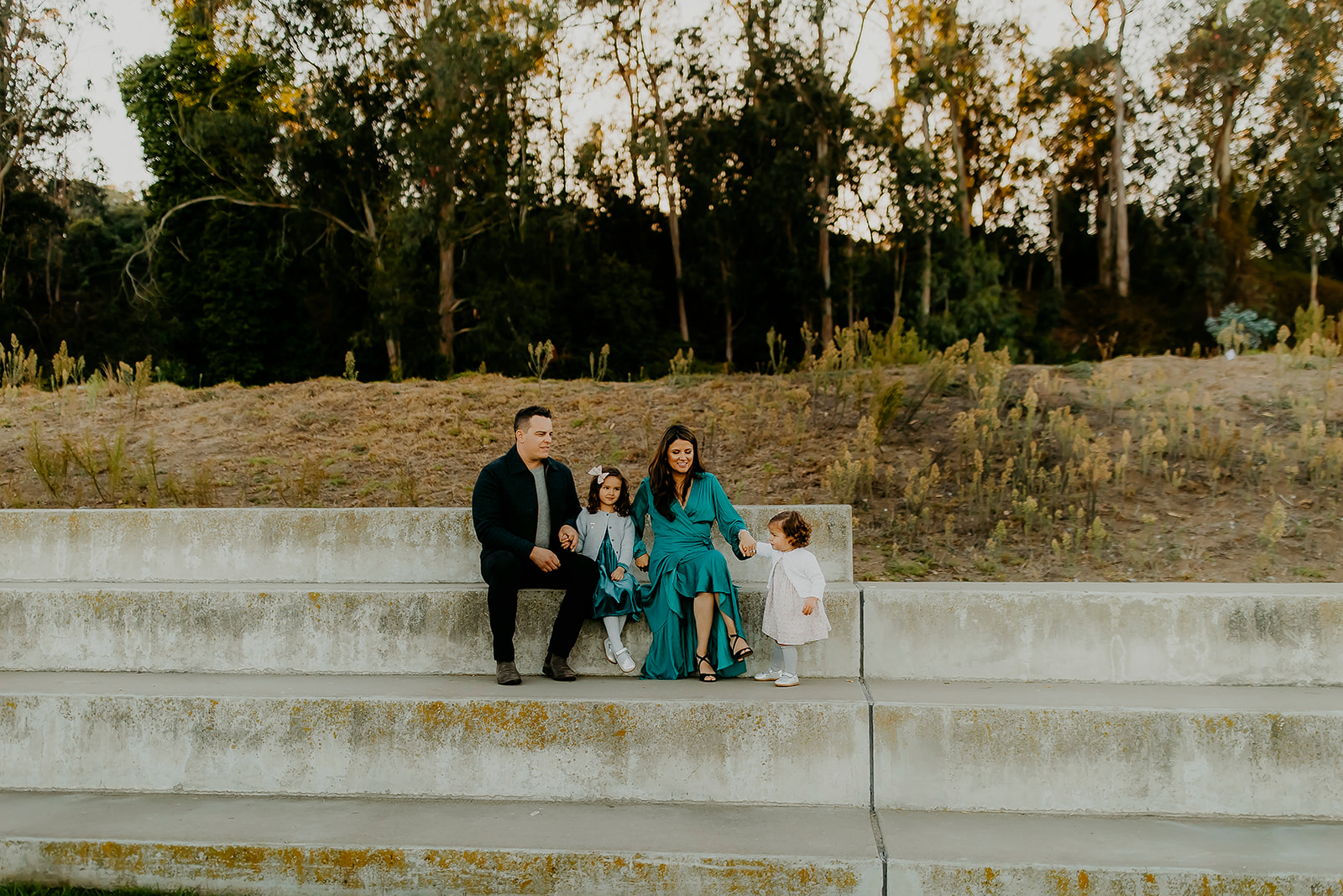 Shefali Parekh | The Best Location for Family Photography: Crissy Field Family of four posing in crissy field