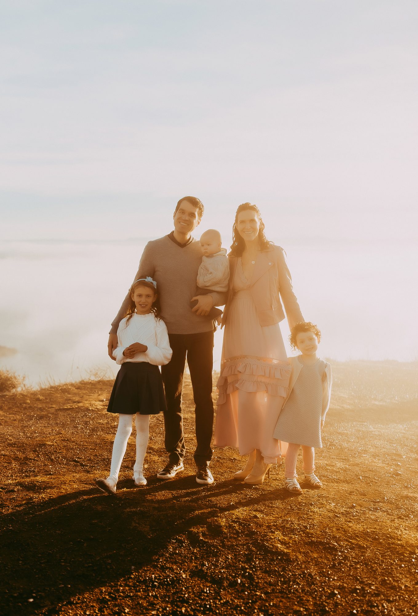 Shefali Parekh | Sunrise Family Photography in Marin County: Capturing Magic in the Morning Happy family posing for a picture