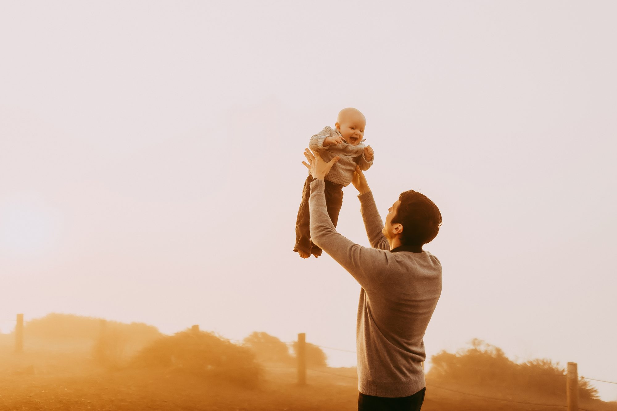 Shefali Parekh | Sunrise Family Photography in Marin County: Capturing Magic in the Morning Father with his infant