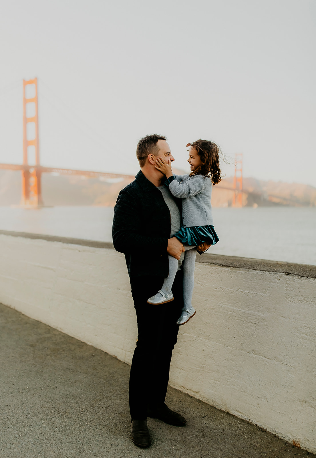 Shefali Parekh | The Best Location for Family Photography: Crissy Field Dad looking at his daughter - crissy field family photos