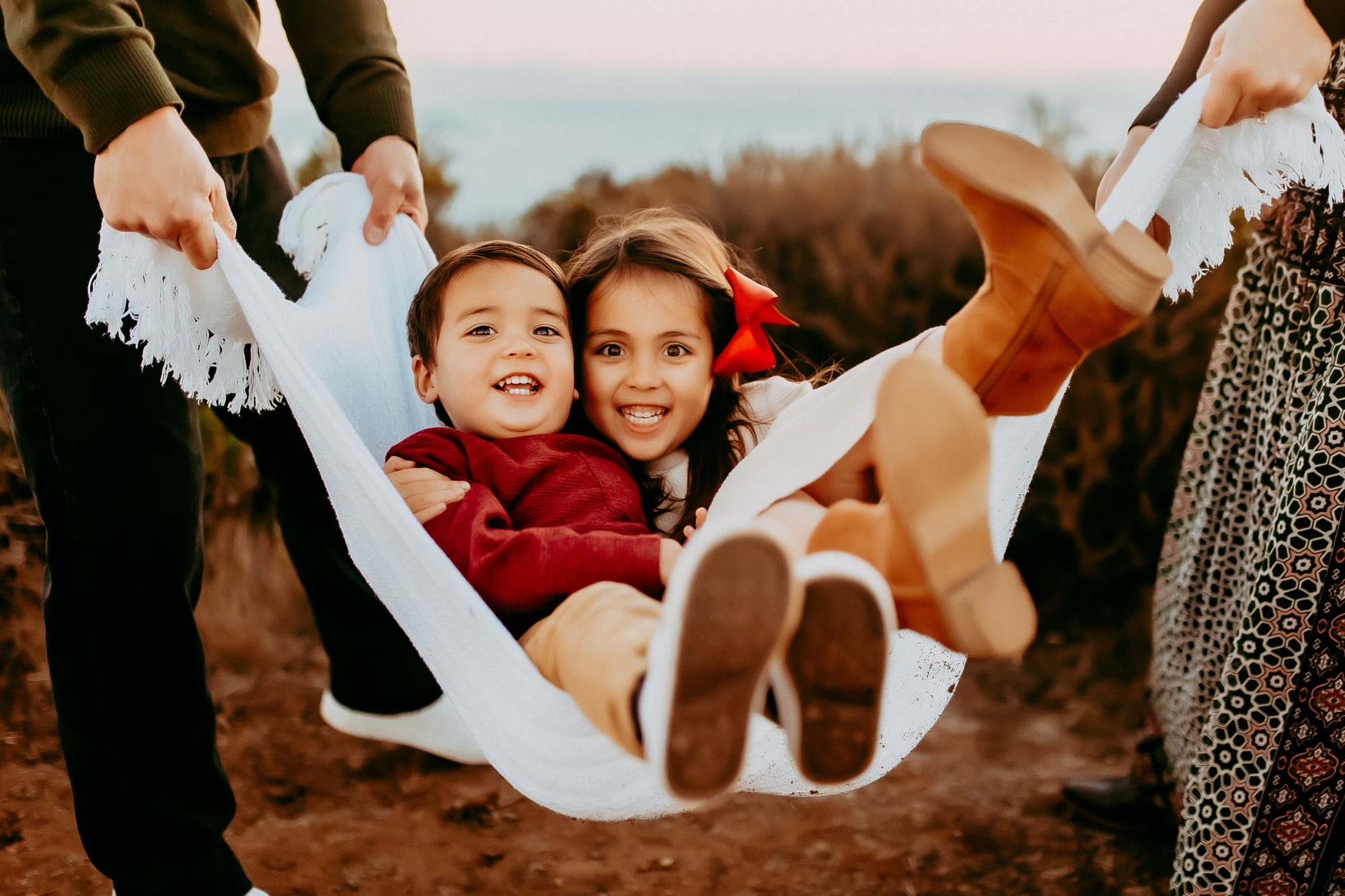 Shefali Parekh | Marin County Family Photographer: Battery Spencer Family Photos Kids playing with their parents being carried