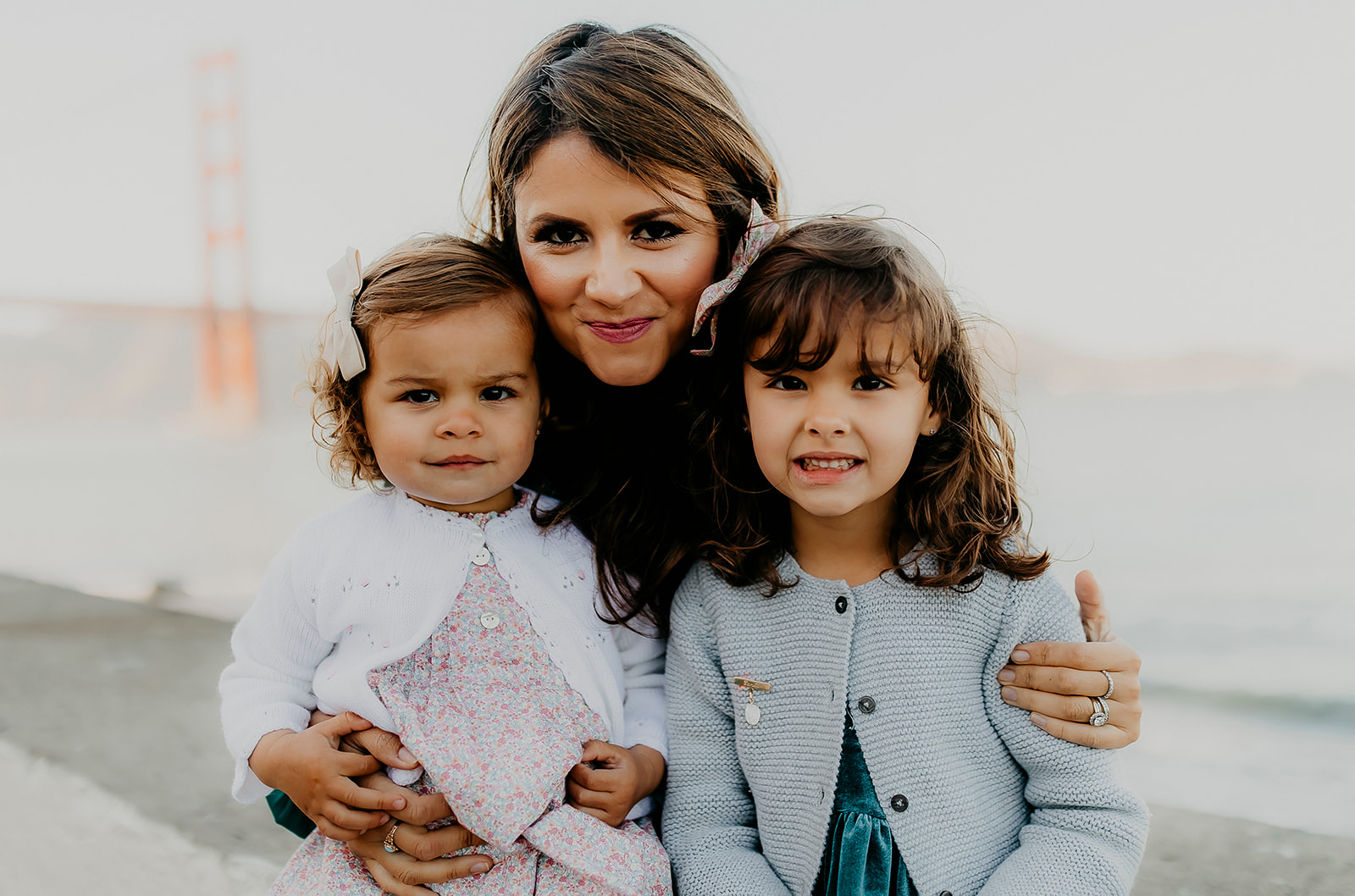 Shefali Parekh | The Best Location for Family Photography: Crissy Field Mother smiling with her two daughters
