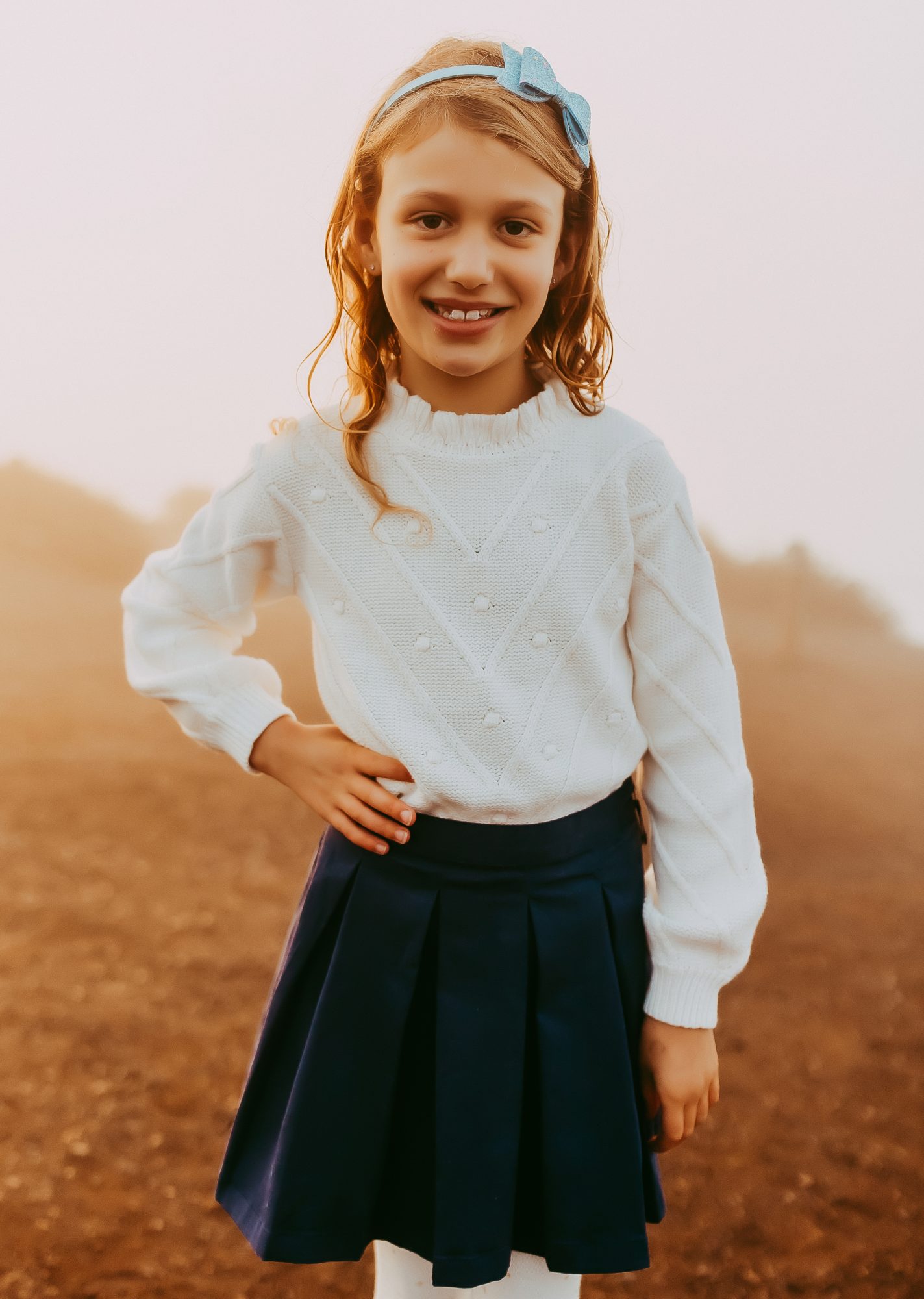 Shefali Parekh | Sunrise Family Photography in Marin County: Capturing Magic in the Morning Oldest kid posing for a picture