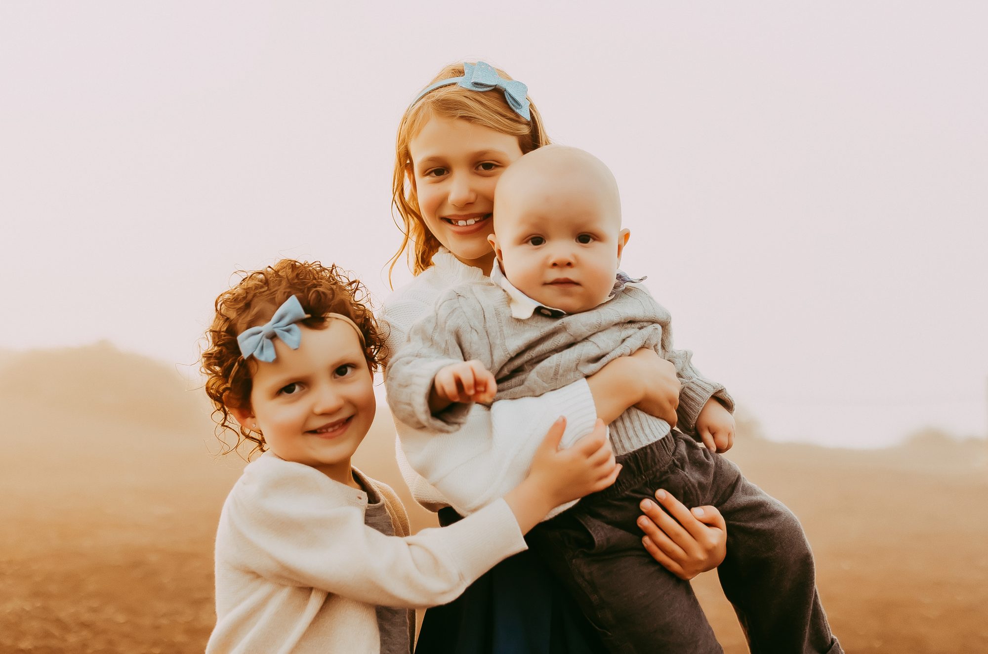 Shefali Parekh | Sunrise Family Photography in Marin County: Capturing Magic in the Morning Three siblings posing together