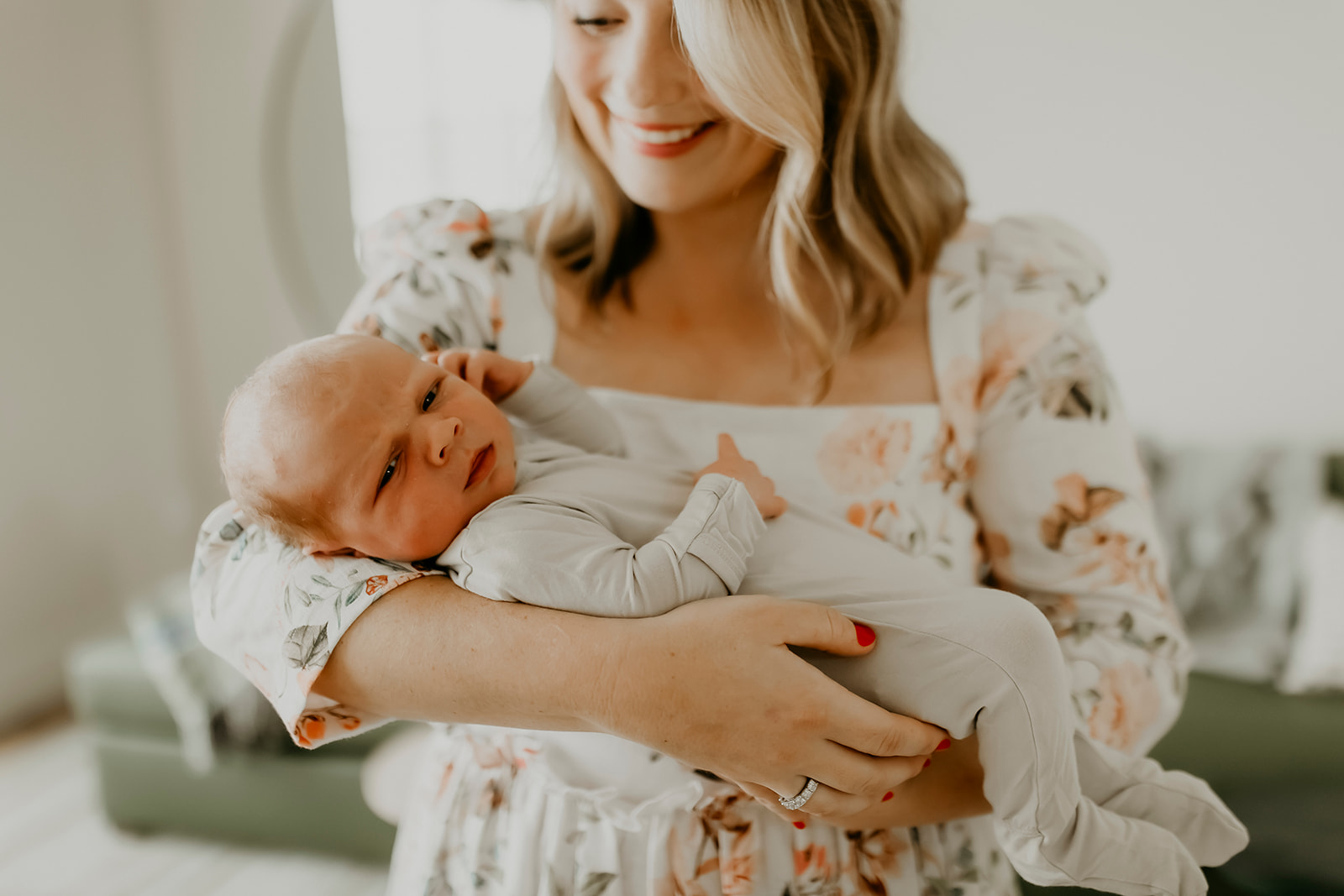Shefali Parekh | Heartwarming In-Home Newborn Session: Maggie & Alex Black in Cow Hollow, San Francisco Happy mother holding her newborn
