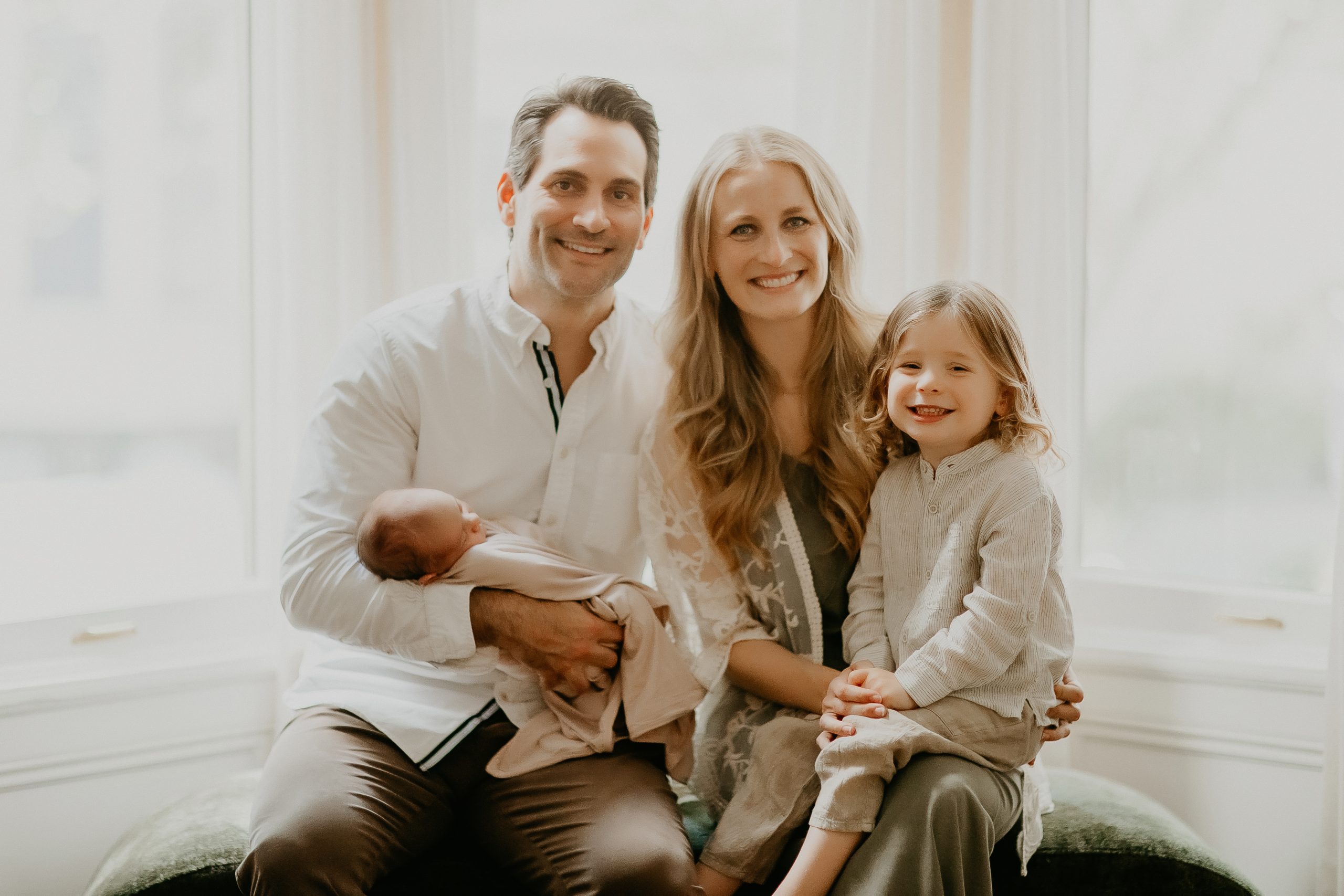 Shefali Parekh | Getting Ready for Your Lifestyle Newborn Photography Session: Tips for New Parents Full family smiling together in San Francisco lifestyle newborn photoshoot