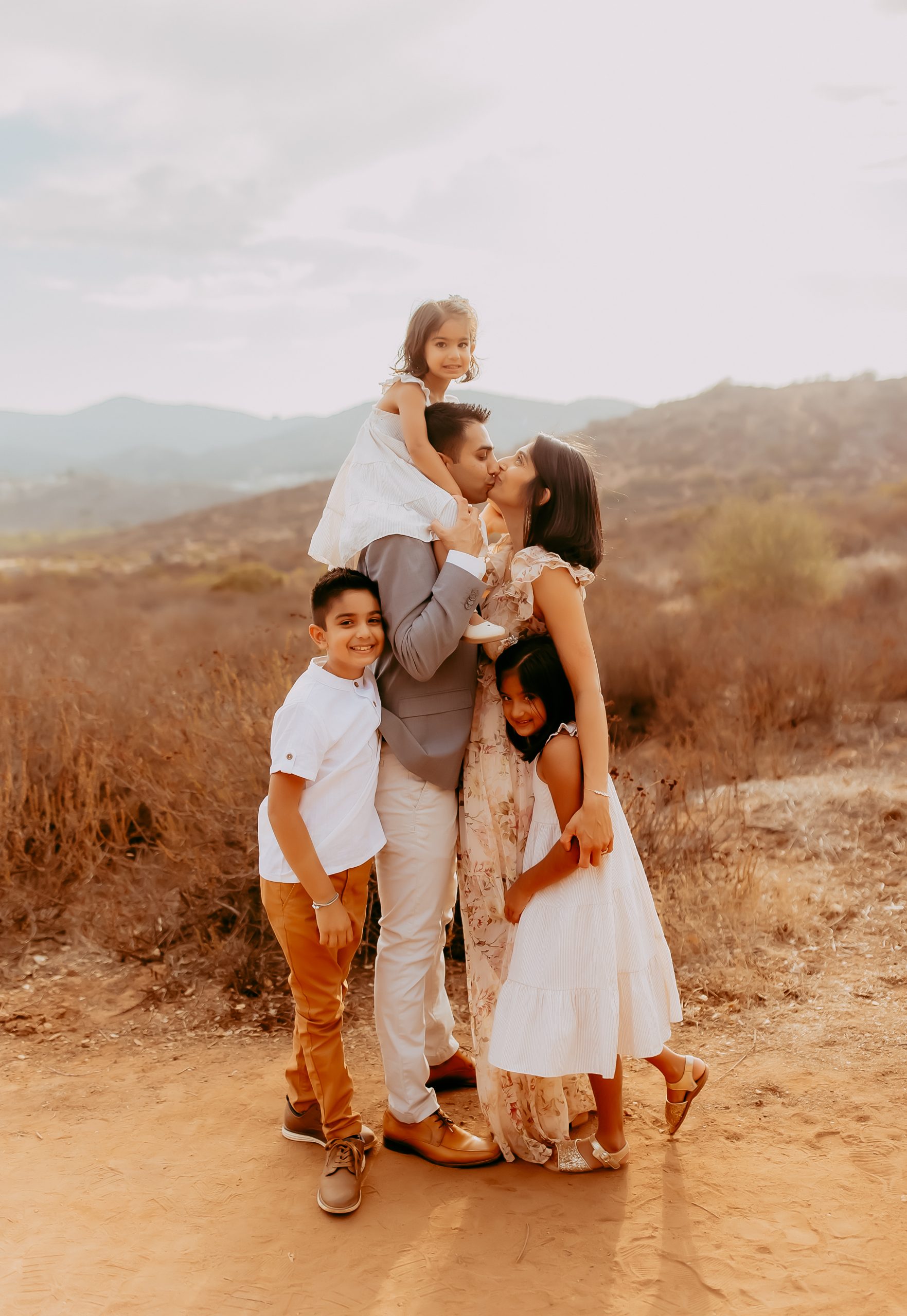Shefali Parekh | Stress-Free Family Photoshoots: Tips from Your Local Bay Area Family Photographer milind parikh with his wife and kids
