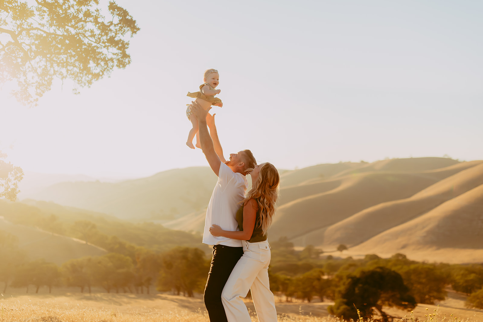 Shefali Parekh | Creating Your Family's Visual Story | Bay Area Photographer Tips Family photo session by a Bay Area family photographer in a field overlooking hills at sunset