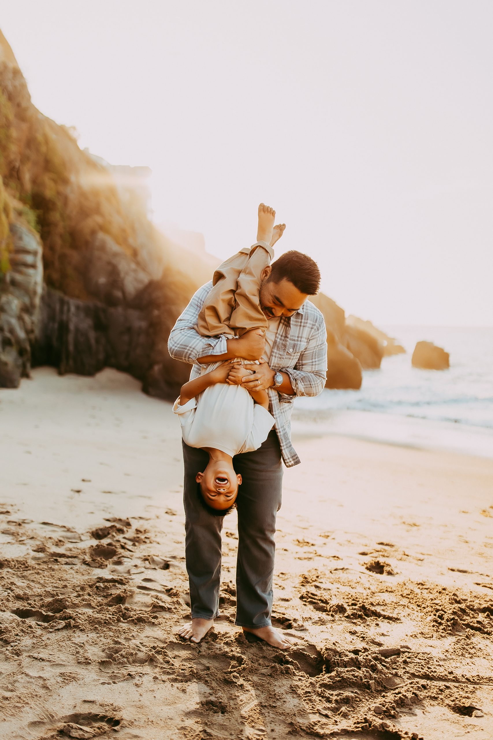Shefali Parekh | Bay Area Beach Family Photoshoot Tips dad and son playing at the beach