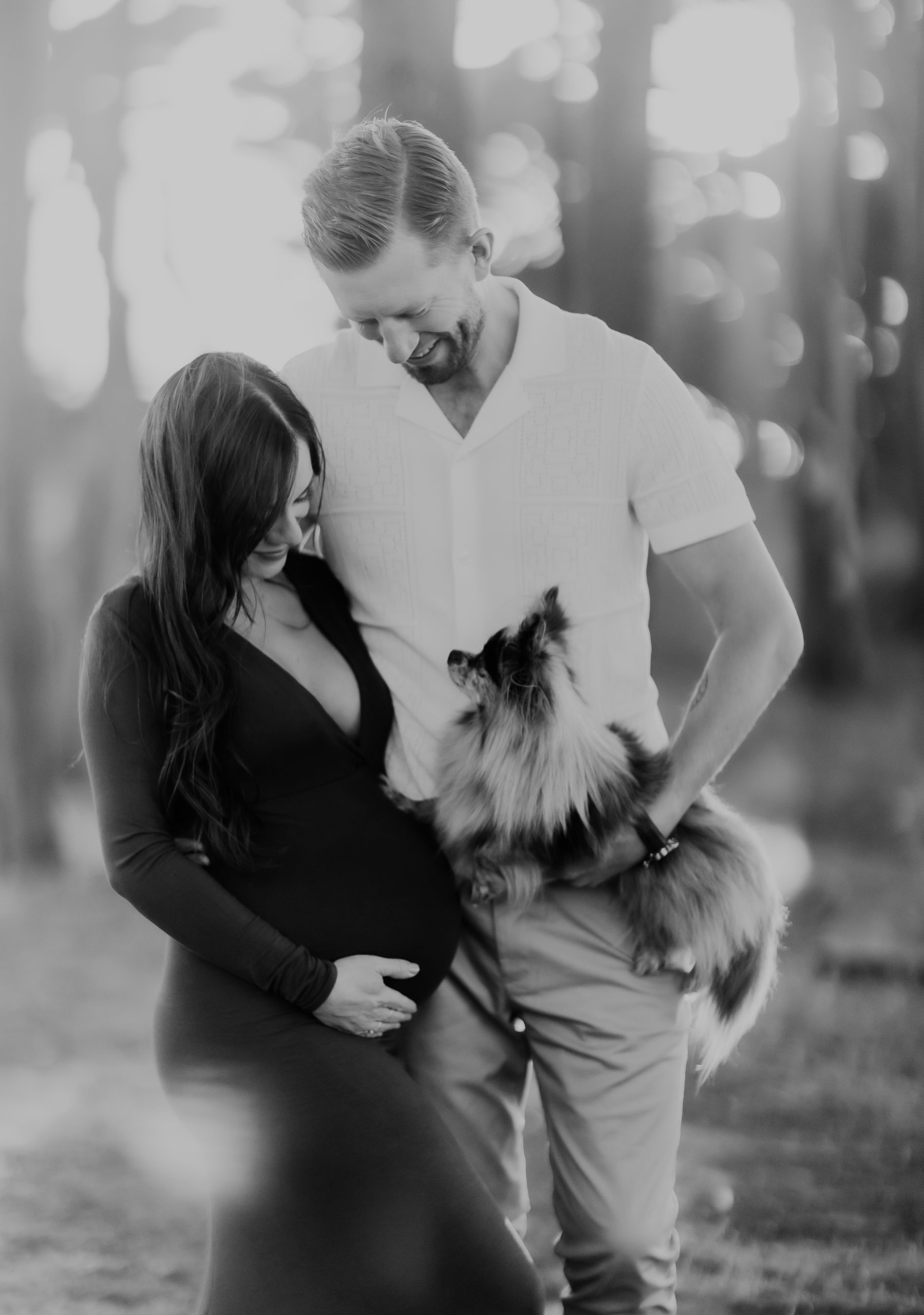 Intimate black-and-white maternity portrait showcasing maternal beauty