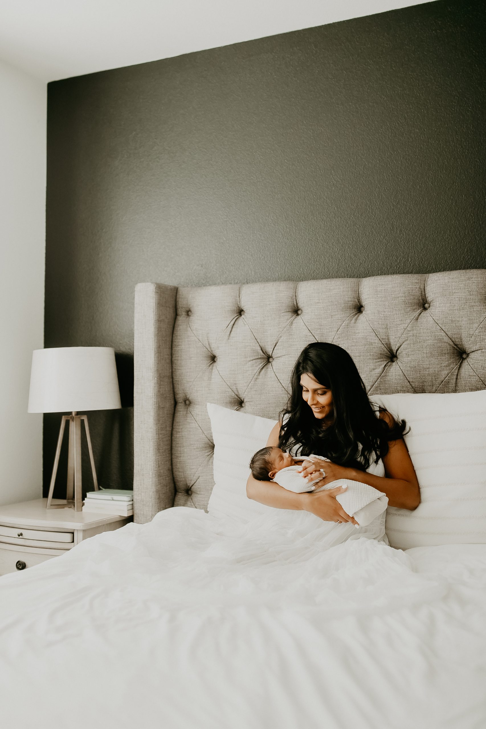 Shefali Parekh | Newborn Photography Trends in San Francisco: What's Popular in 2025 Gentle embrace between a mother and her newborn baby