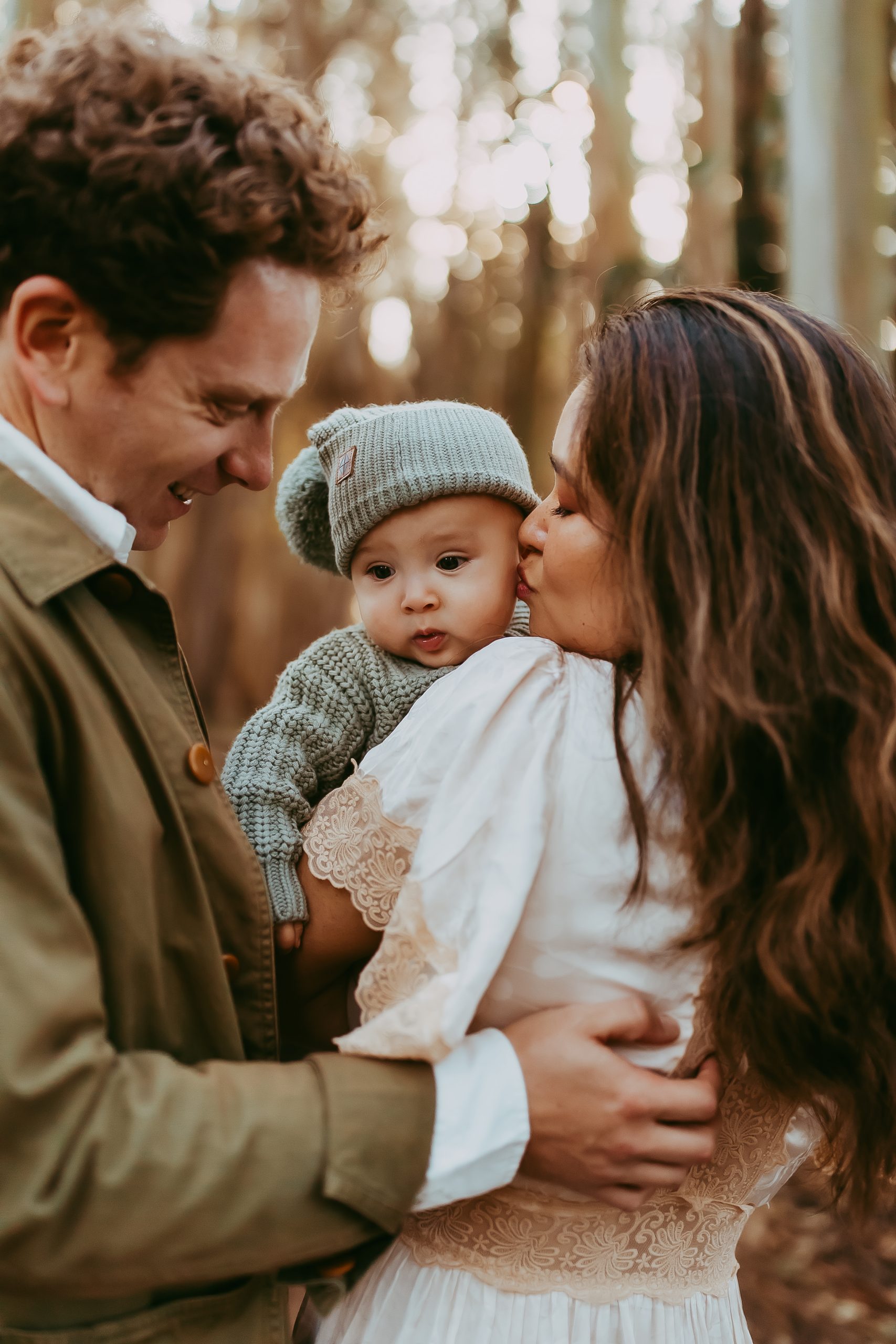 Shefali Parekh | Lovers Lane, San Francisco Family Photography Session Sweet kiss from mom and dad to baby during a family shoot in Lovers Lane