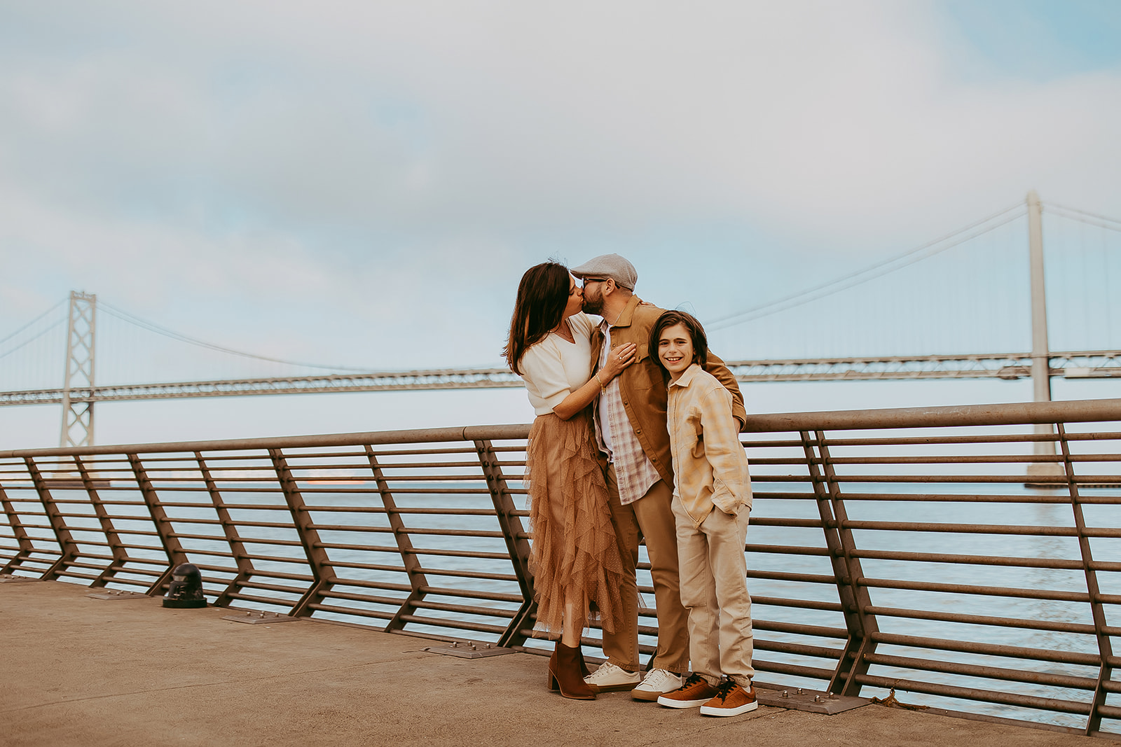 Shefali Parekh | Bay Area Fall Mini Sessions 2025 family standing on pier overlooking bay bridge